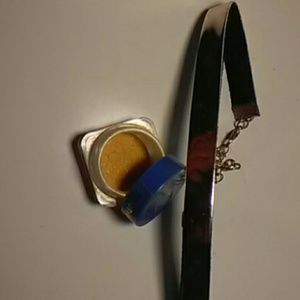 Gold eyeshadow with gold choker